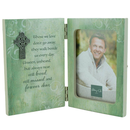 Irish memorial hinged photo frame with a Celtic cross design and a poem quote on the left side, displaying a photo of a smiling person on the right side.