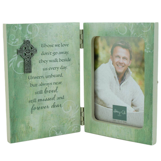 Irish memorial hinged photo frame with a Celtic cross design and a poem quote on the left side, displaying a photo of a smiling person on the right side.