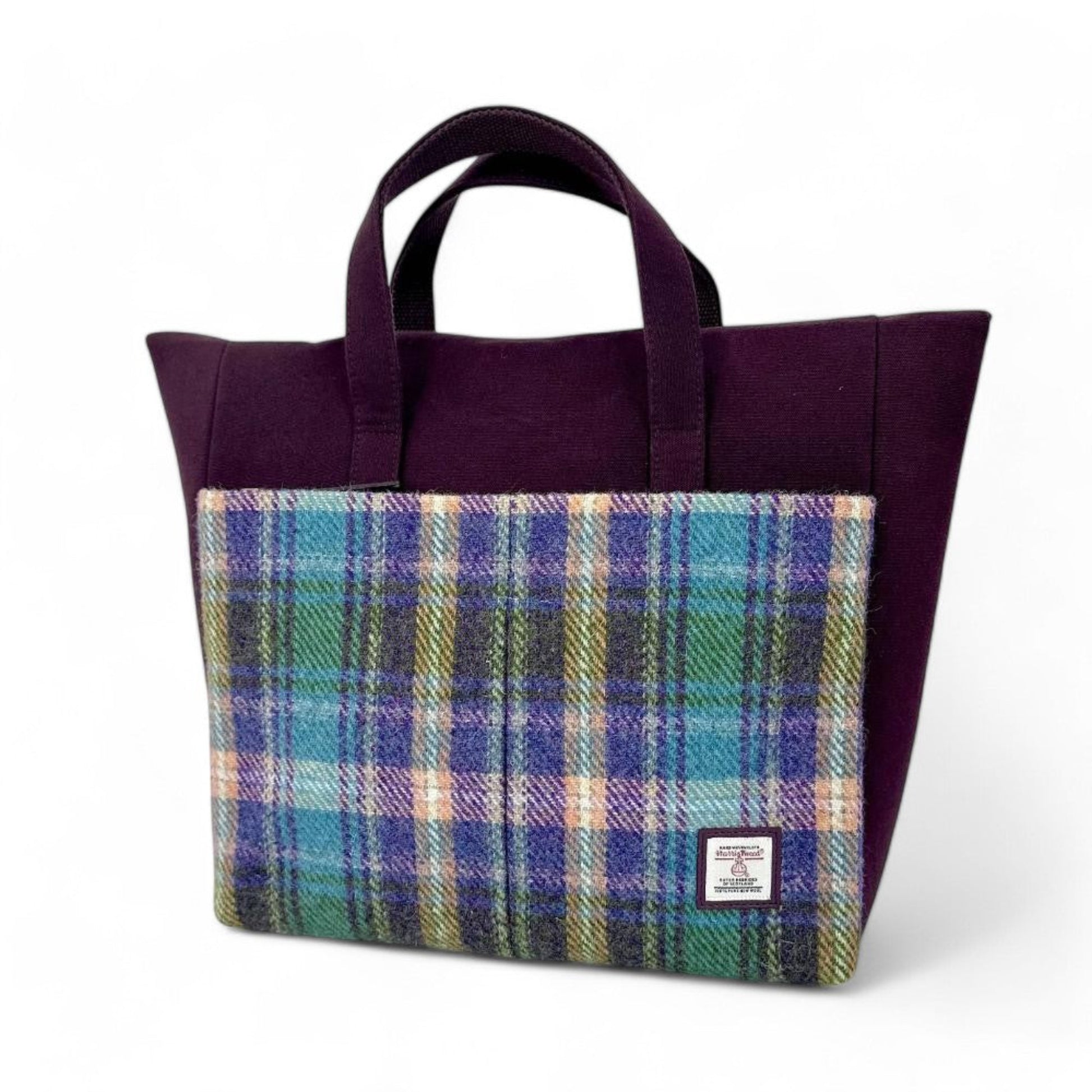 Tote bag with plaid pattern on a white background