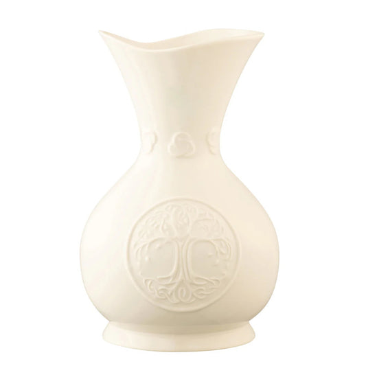 A white ceramic vase with a Tree of Life pattern design.