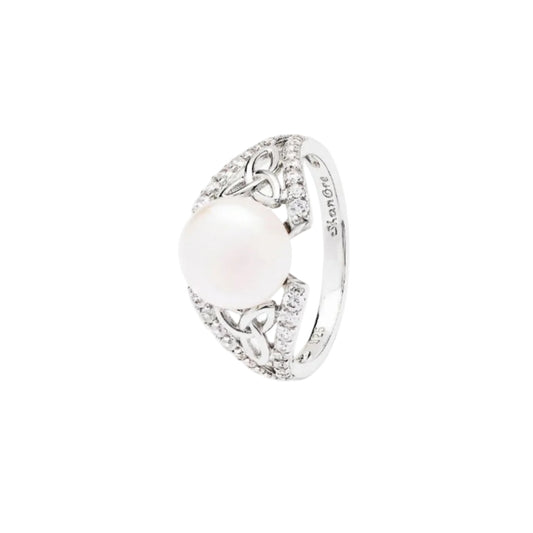 Silver ring with a large central gemstone and smaller stones on a white background