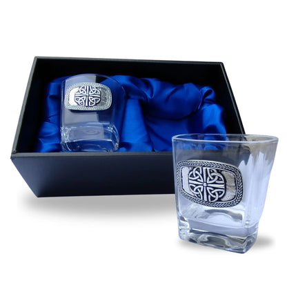 Two crystal whiskey glasses with four trinity knot design in a black box lined with blue satin