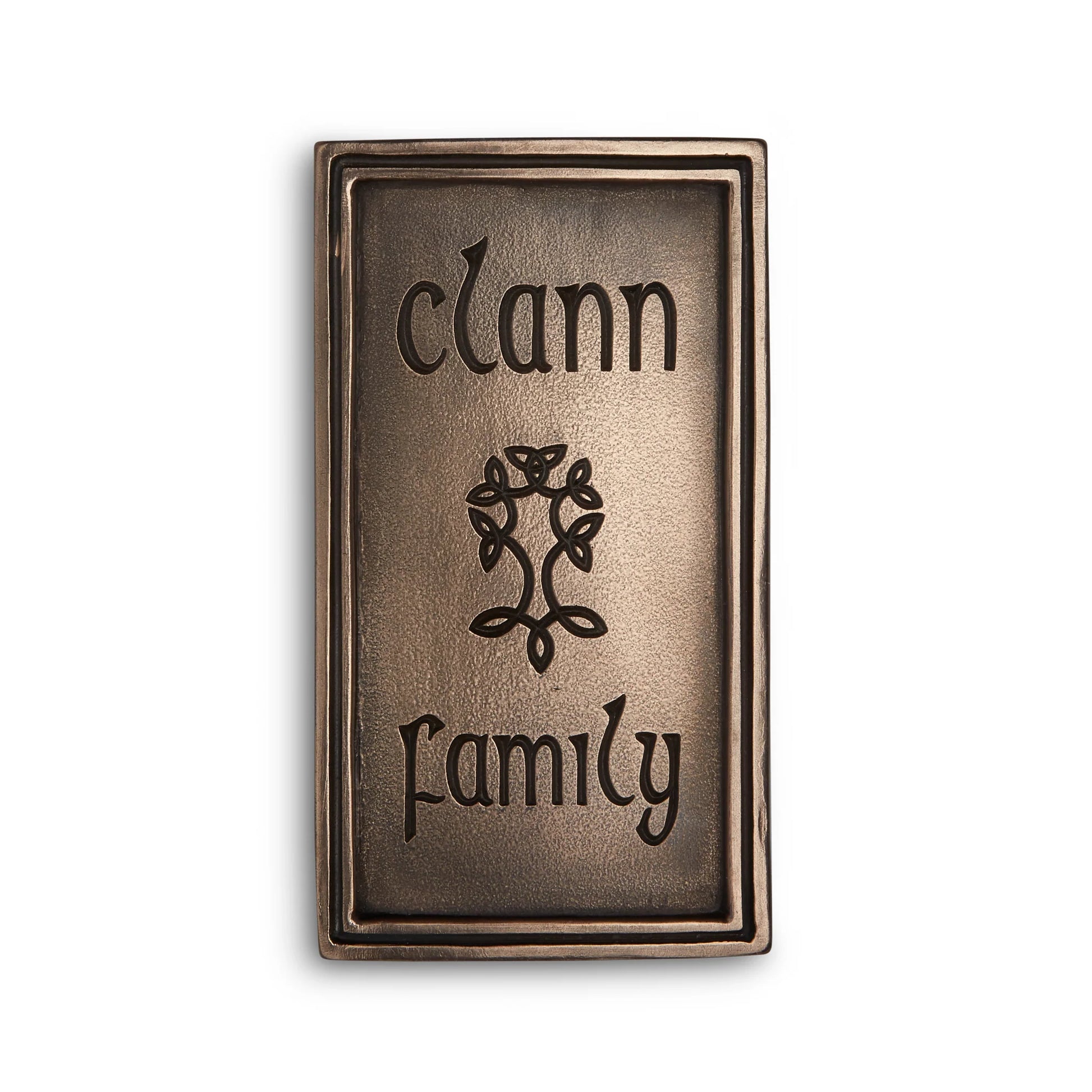 Bronze plaque with "clann" engraved on the top, "family" engraved on the bottom, and a tree engraved in the middle