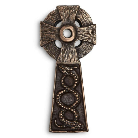 A bronze celtic cross with two serpents entwined in the staff