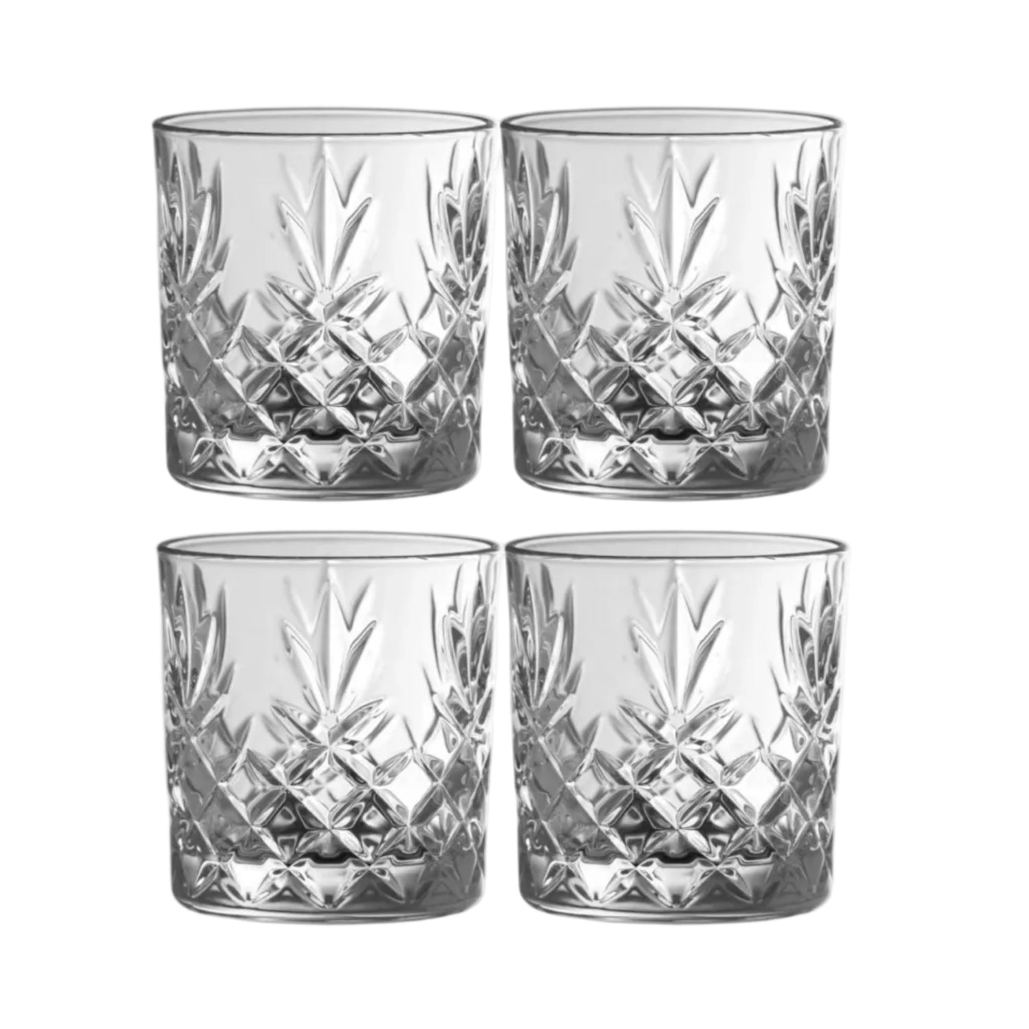 Four clear glass tumblers with diamond cut design on a white background