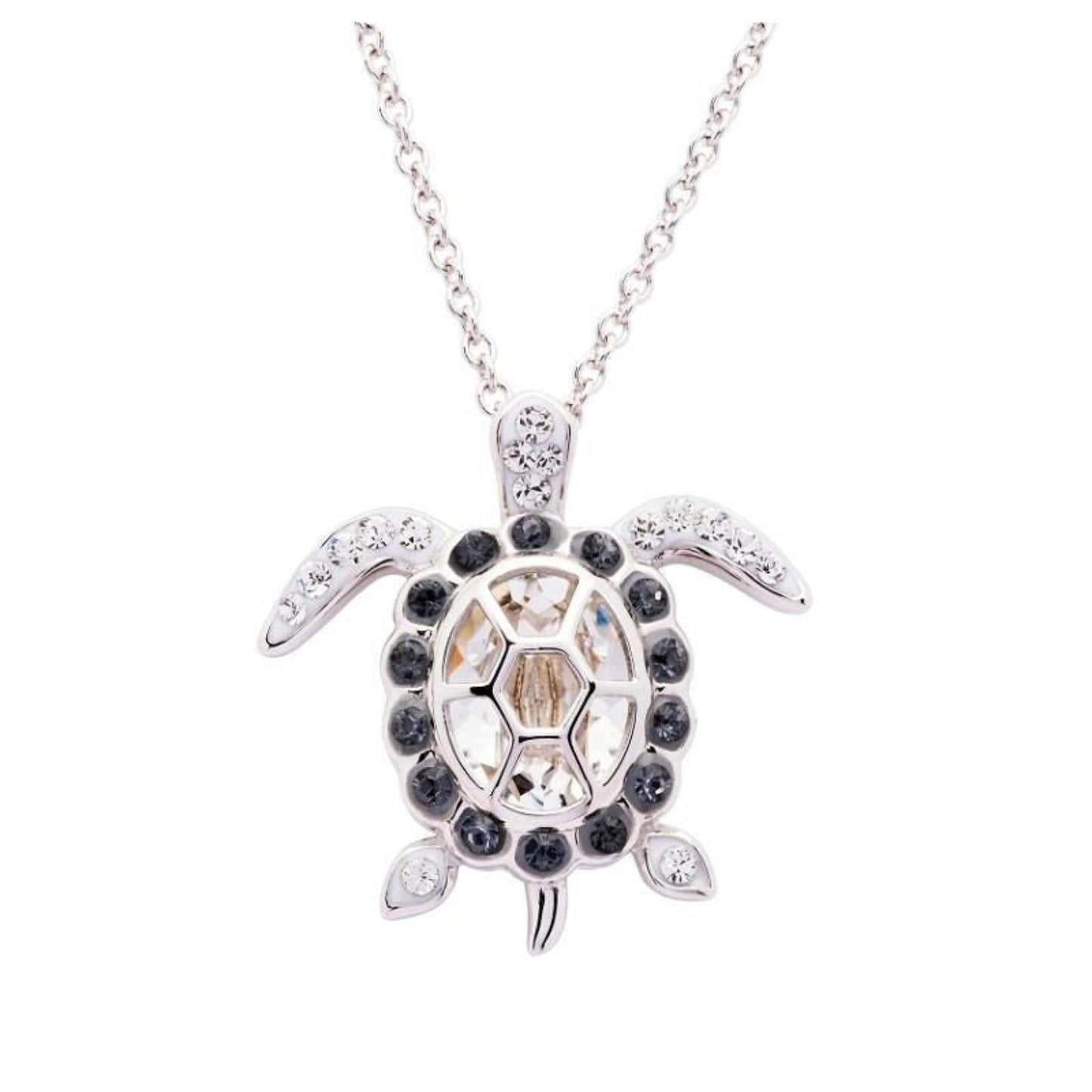 Turtle-shaped pendant necklace with gemstones on a white background