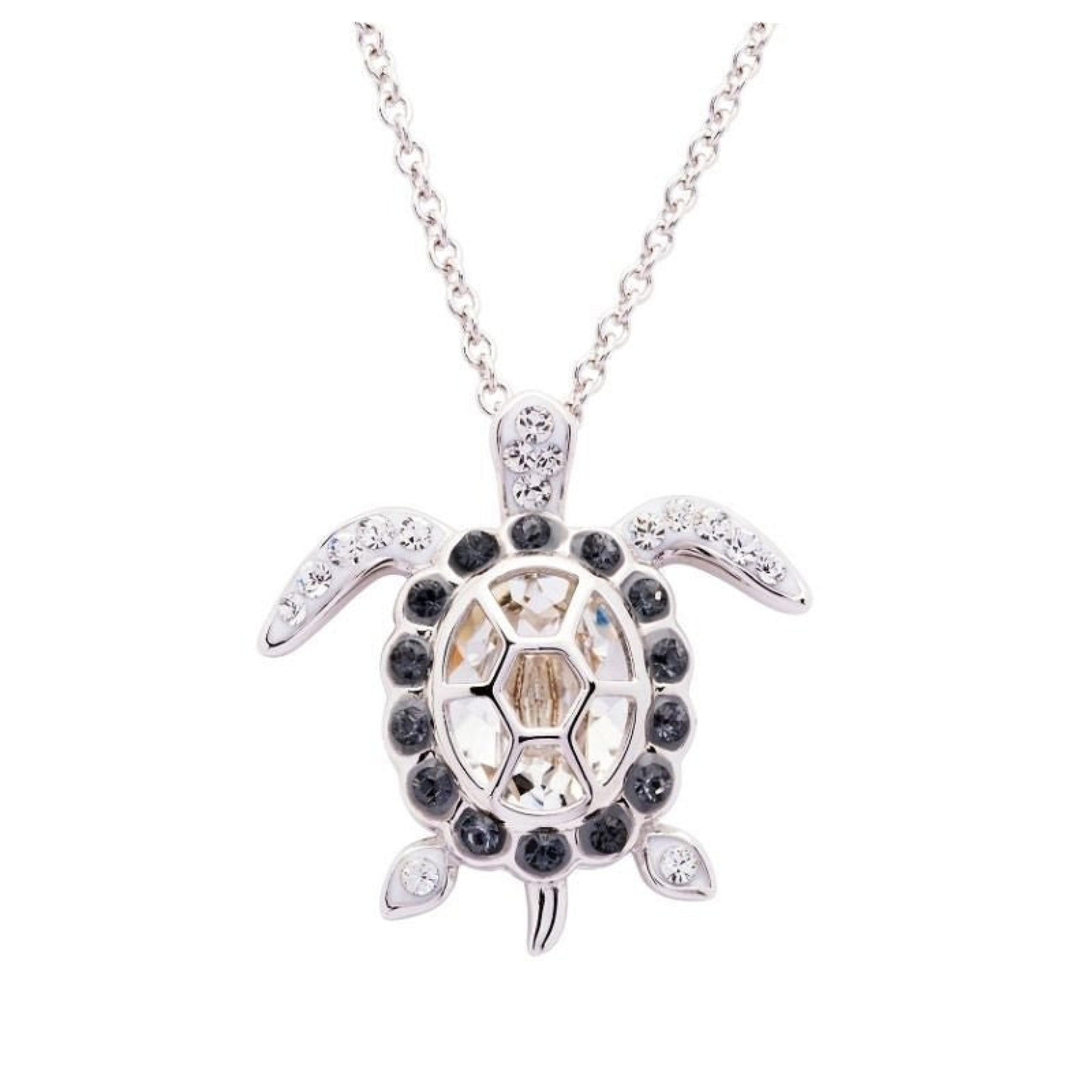 Turtle-shaped pendant necklace with gemstones on a white background