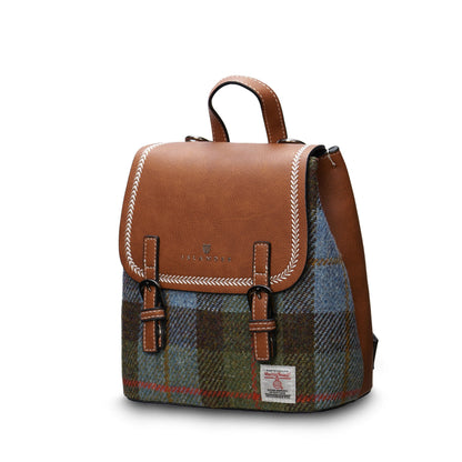 A blue and green Mini Jura backpack with a PU leather body and a Harris Tweed front panel, featuring a magnetic clasp, hidden zip pocket, reinforced handle, and adjustable shoulder straps.