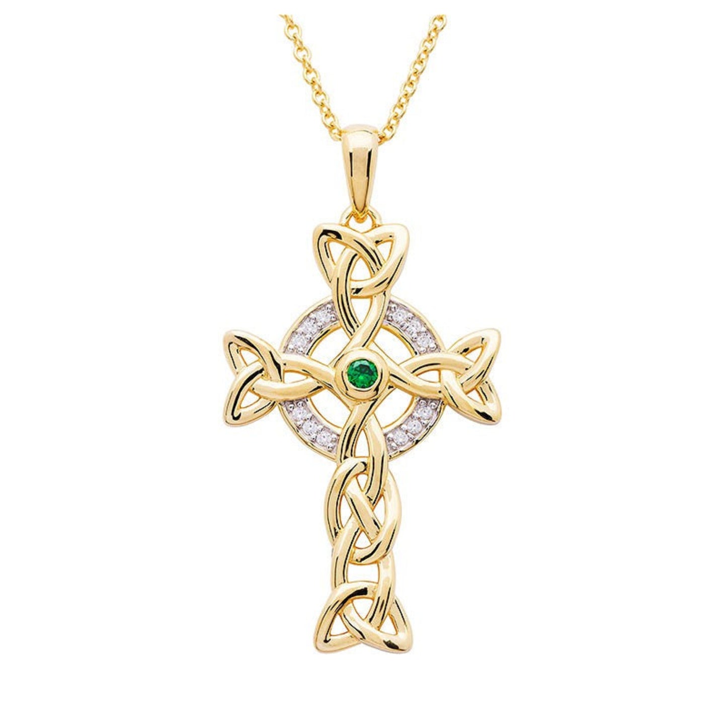 A gold Celtic cross necklace with white cubic zirconias and a central green emerald stone on a chain.