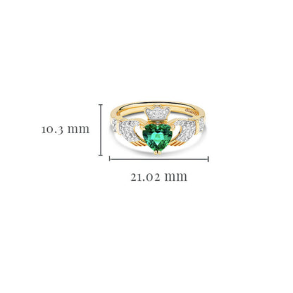 Gold claddagh ring measuring 10.3 millimeters high and 21.02 millimeters wide.