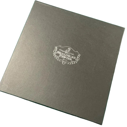 Gray box with a logo on a green background