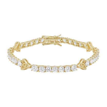 Gold bracelet with diamond accents on a white background