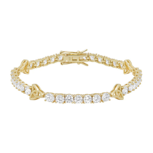 Gold bracelet with diamond accents on a white background