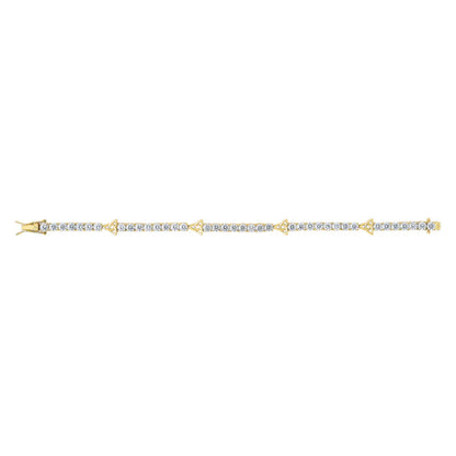 Gold bracelet with diamond accents on a white background