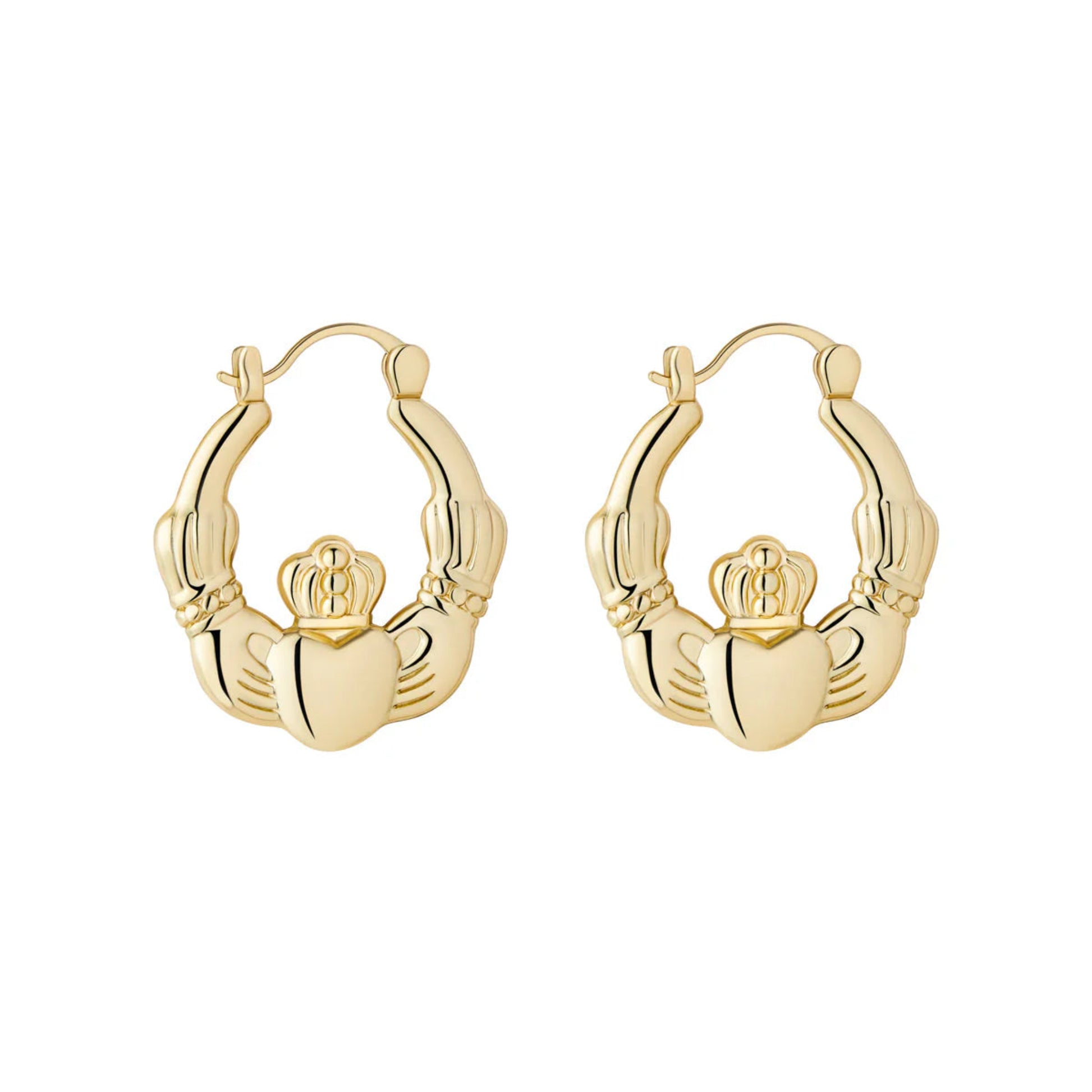 Gold claddagh hoop earrings on a white background