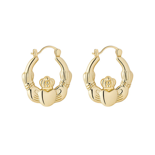 Gold claddagh hoop earrings on a white background