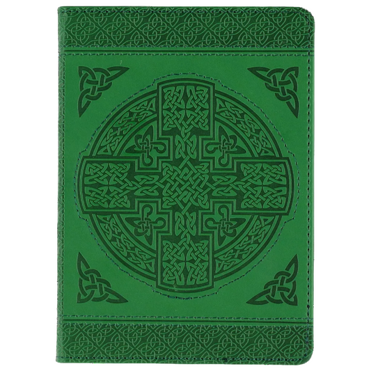 Green leather notebook with Celtic cross design on a green background