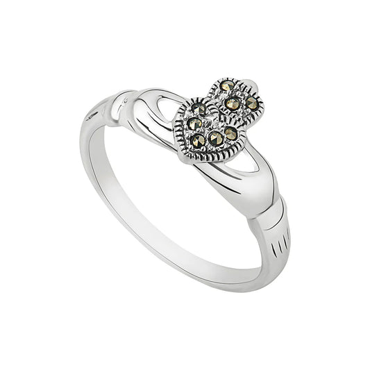 Silver ring with heart-shaped gemstone on a white background