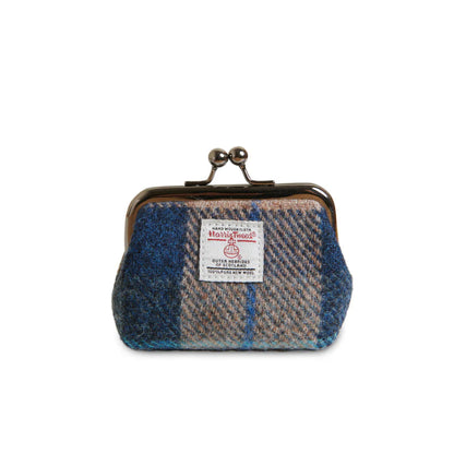 Small Harris Tweed purse with a visible brand label on a white background