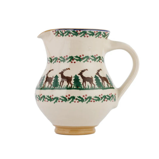 Ceramic pitcher with deer and tree pattern 