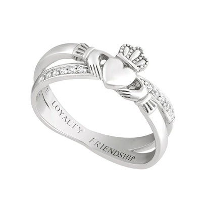 Silver Claddagh ring with heart and crown design on a white background