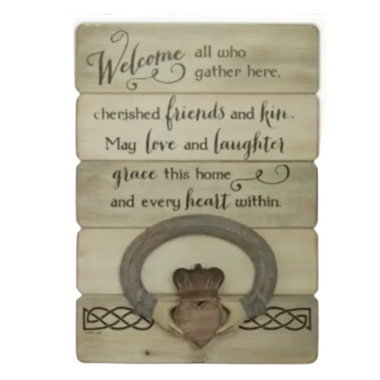 A rustic wooden-style plaque with an Irish welcome message, a heart shape resin accent, and a crown emblem in the center.